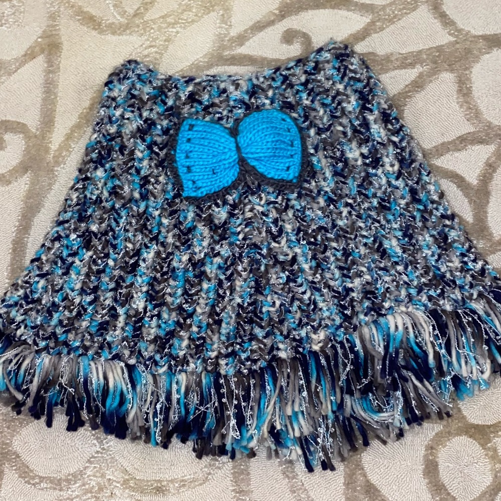 Never worn girls Peace of Cake shaggy bow poncho!!